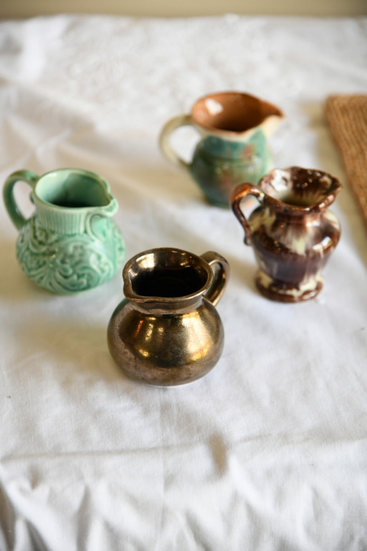 4 Miniature Jugs