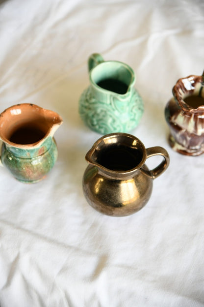 4 Miniature Jugs