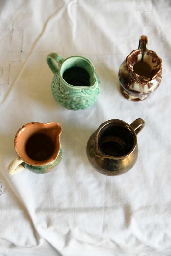 4 Miniature Jugs