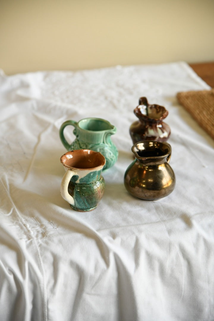 4 Miniature Jugs