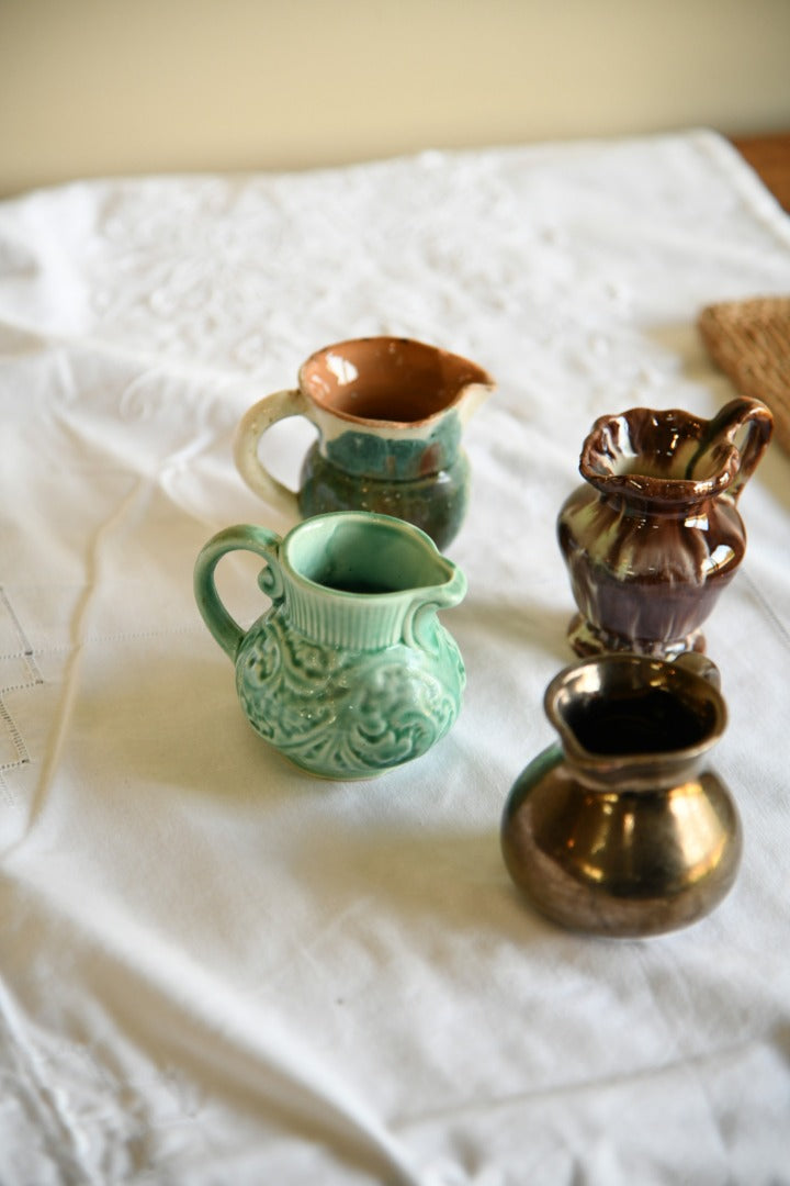 4 Miniature Jugs