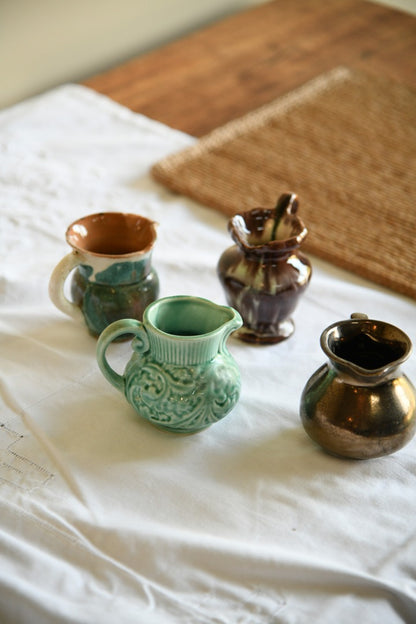 4 Miniature Jugs