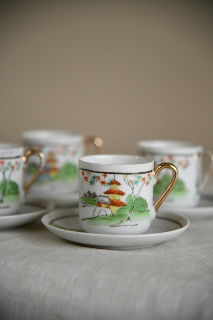 4 Oriental Coffee Cups and Saucers