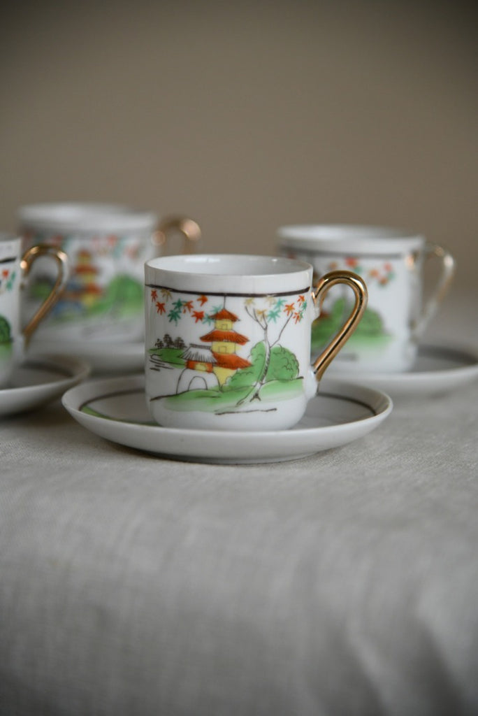 4 Oriental Coffee Cups and Saucers