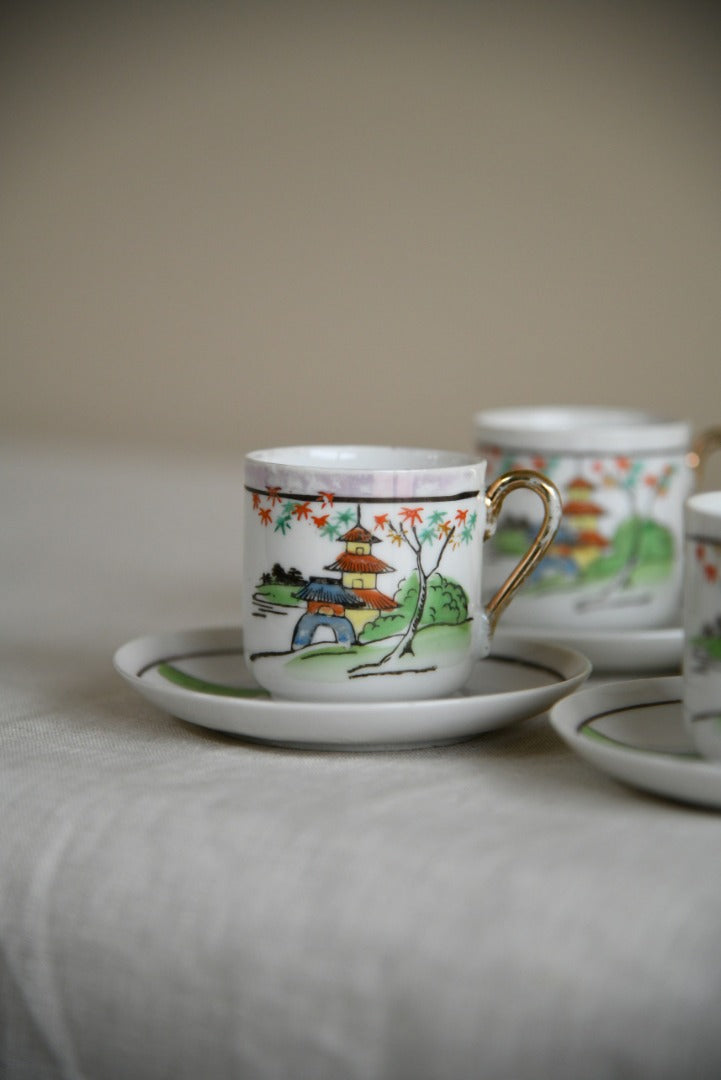 4 Oriental Coffee Cups and Saucers