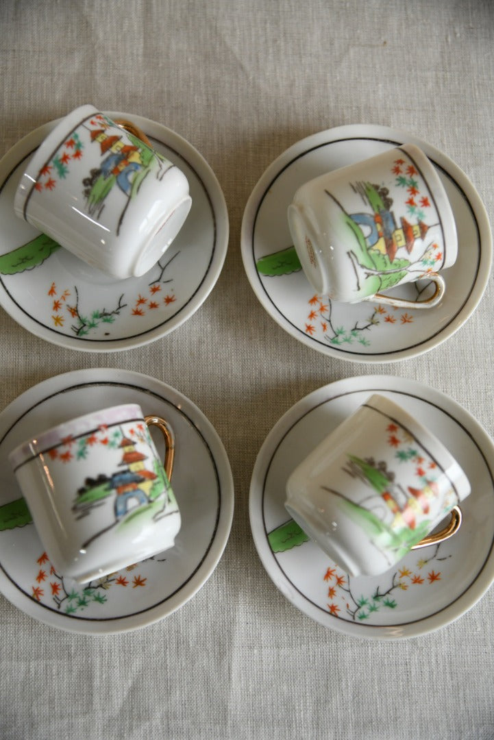 4 Oriental Coffee Cups and Saucers