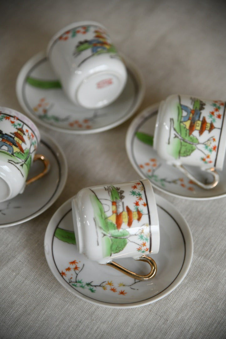 4 Oriental Coffee Cups and Saucers