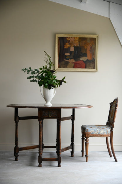 Carved Oak Drop Leaf Table