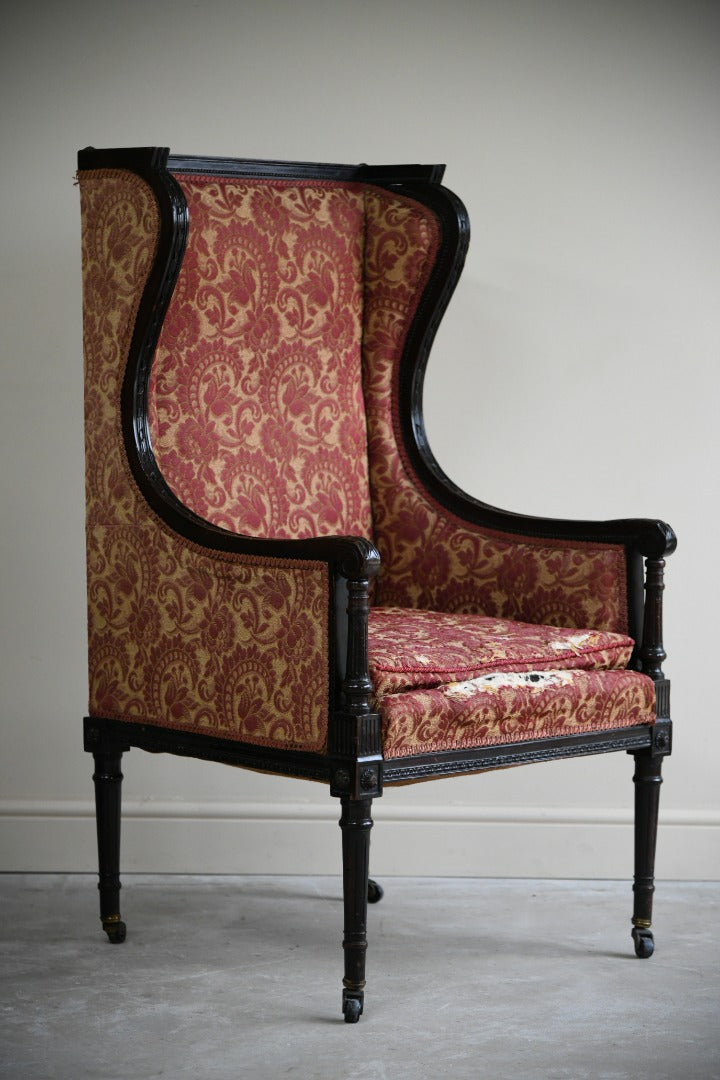 Antique Upholstered Wing Back Armchair