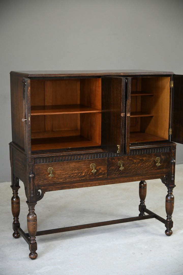 A Gardner & Son Oak Cabinet On Stand