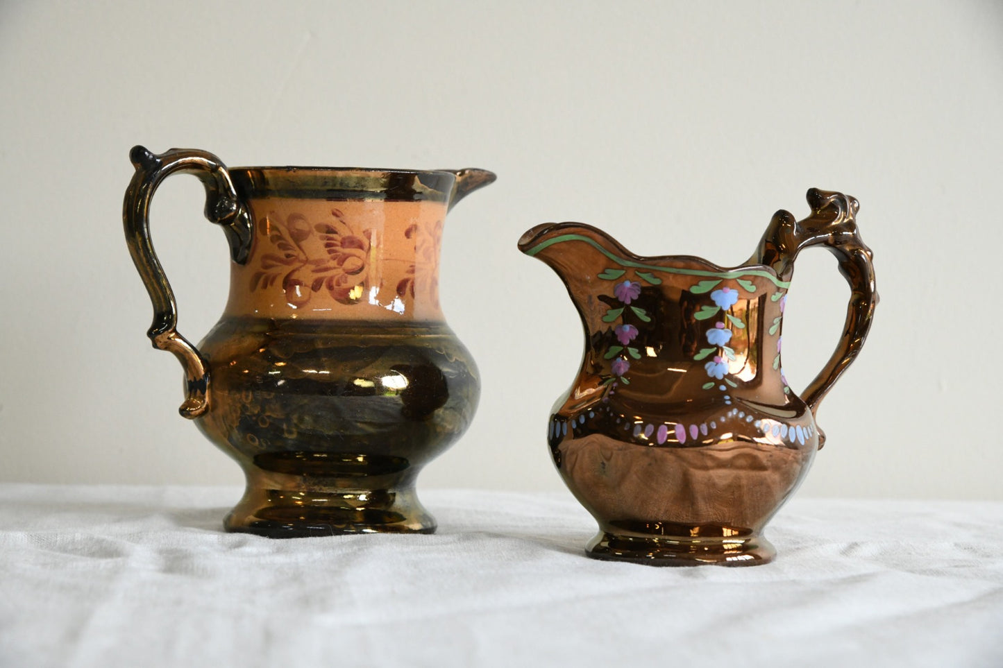 2 x Antique Copper Lustre Jugs