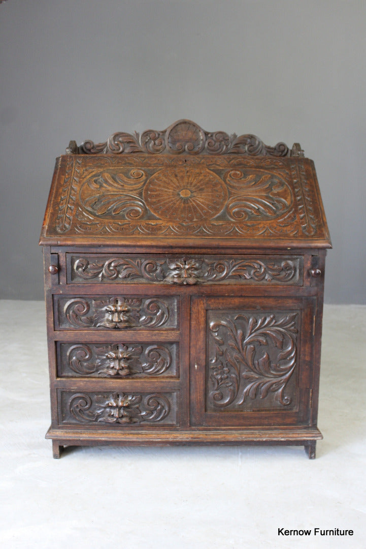 Carved Oak Green Man Writing Bureau - Kernow Furniture