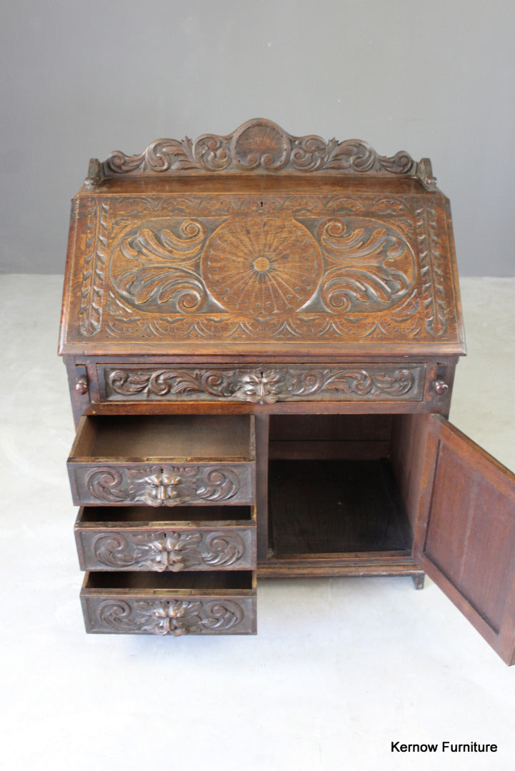 Carved Oak Green Man Writing Bureau - Kernow Furniture