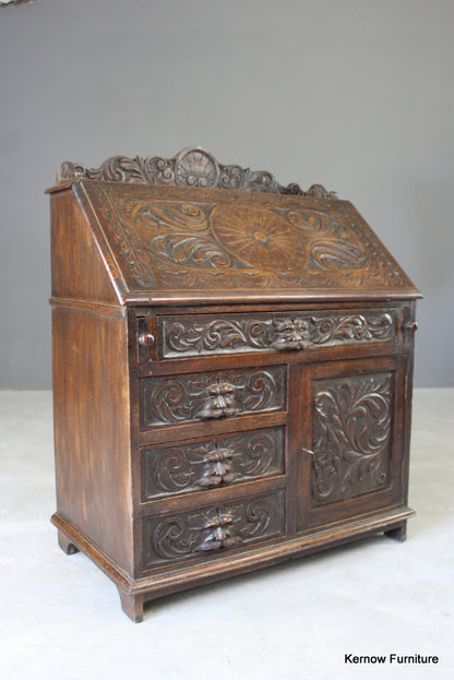 Carved Oak Green Man Writing Bureau - Kernow Furniture