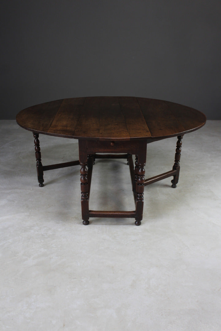 Antique Oak Oval Drop Leaf Dining Table - Kernow Furniture