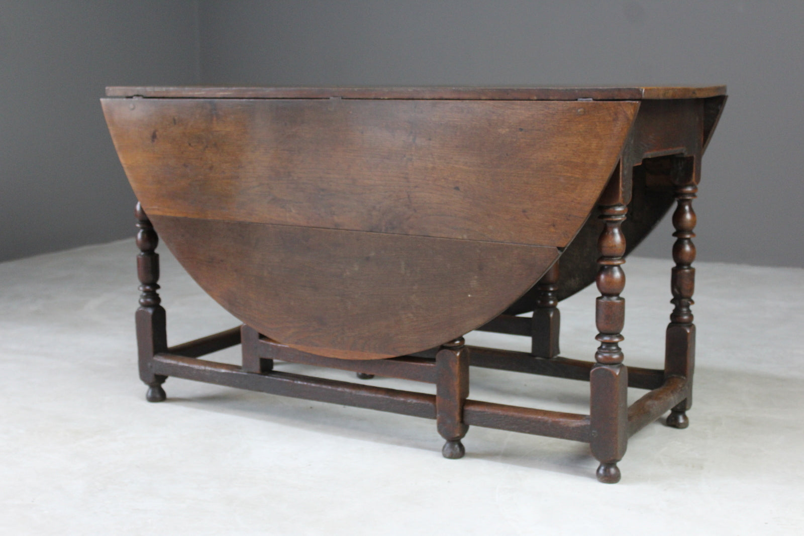 Antique Oak Oval Drop Leaf Dining Table - Kernow Furniture