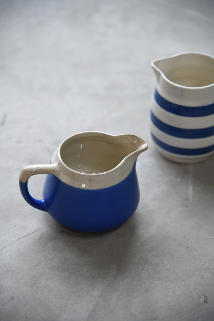 Two Vintage Blue & Crem Milk Jugs