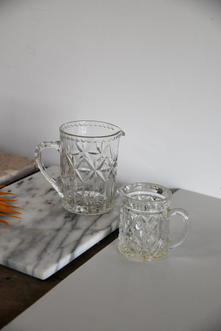 Two Vintage Moulded Glass Jugs