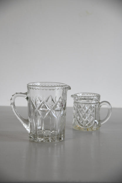 Two Vintage Moulded Glass Jugs